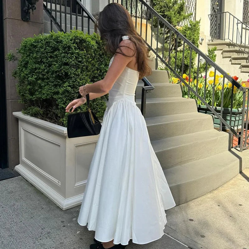 TARUXY Sexy Deep V Hollow Halterneck Large Hem Dress For Women Solid High Waisted Backless Splice Summer New Vacation Long Dress