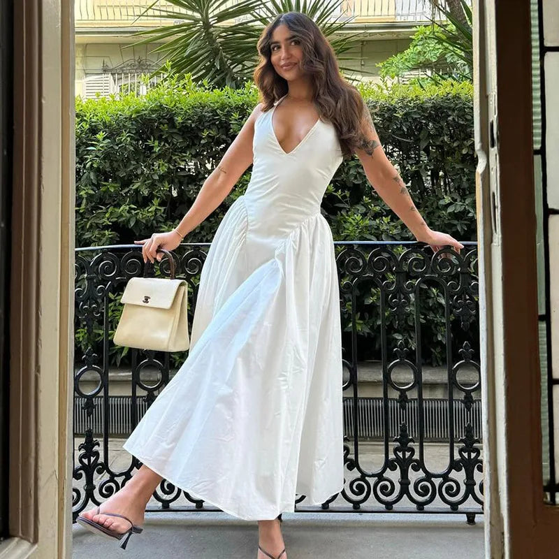 TARUXY Sexy Deep V Hollow Halterneck Large Hem Dress For Women Solid High Waisted Backless Splice Summer New Vacation Long Dress