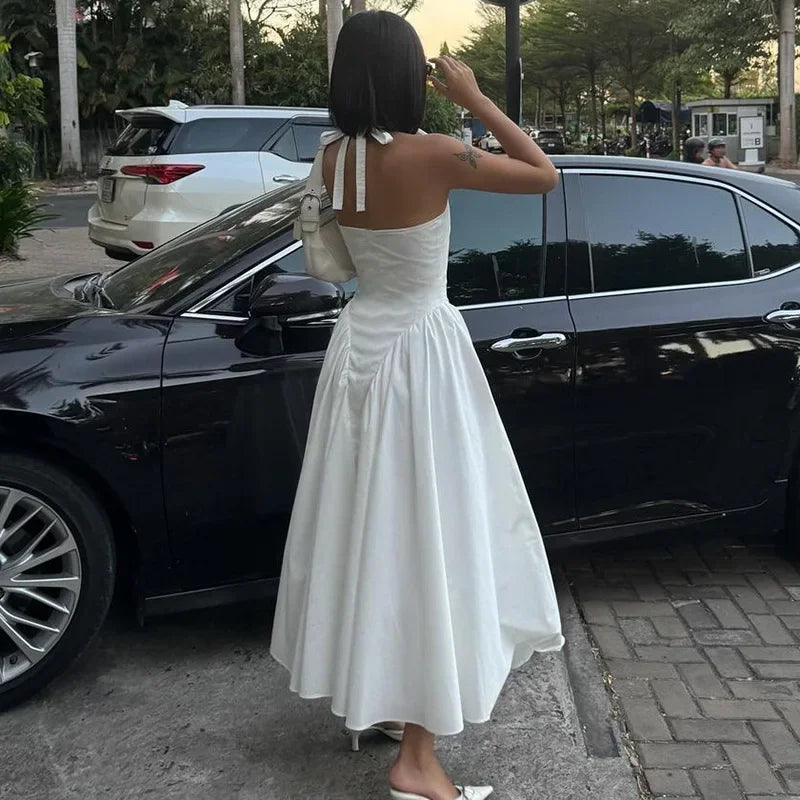 TARUXY Sexy Deep V Hollow Halterneck Large Hem Dress For Women Solid High Waisted Backless Splice Summer New Vacation Long Dress