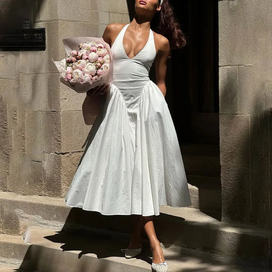 TARUXY Sexy Deep V Hollow Halterneck Large Hem Dress For Women Solid High Waisted Backless Splice Summer New Vacation Long Dress